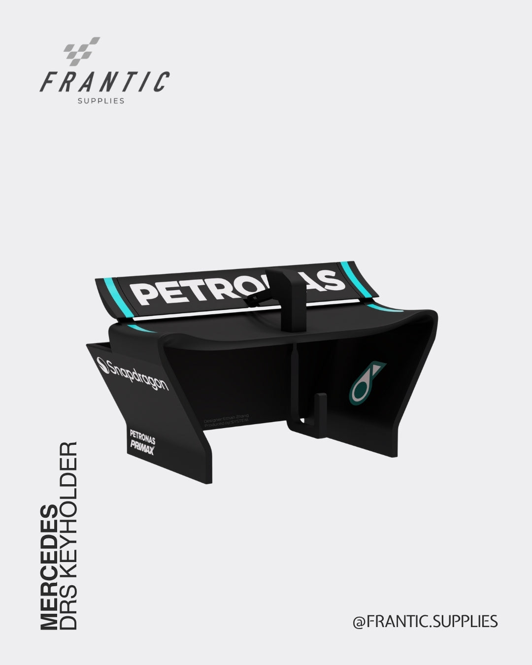 Mercedes DRS keyholder with Petronas logo and turquoise accent stripes in a black wing design displayed on a white background, branded Frantic Supplies.