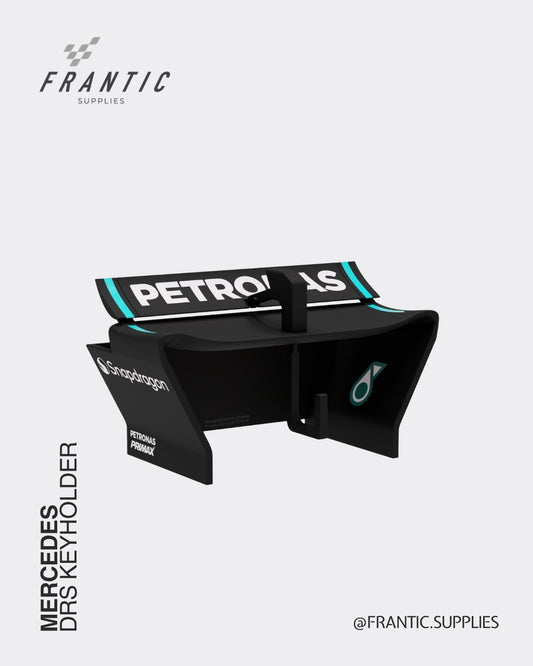 Mercedes DRS keyholder with Petronas logo and turquoise accent stripes in a black wing design displayed on a white background, branded Frantic Supplies.
